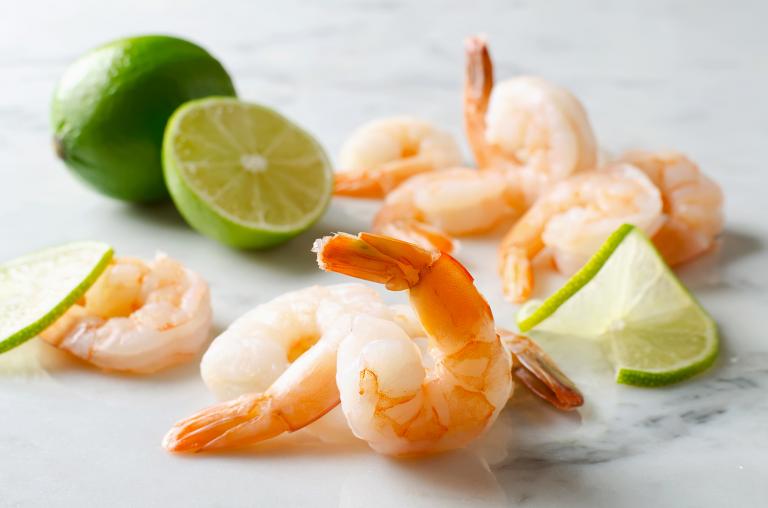 shrimp and sliced limes
